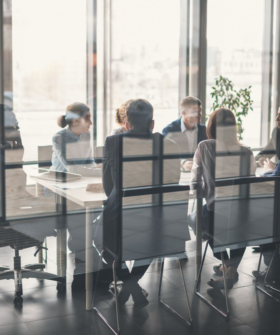 talent acquisition professionals analyzing recruitment data and performance metrics